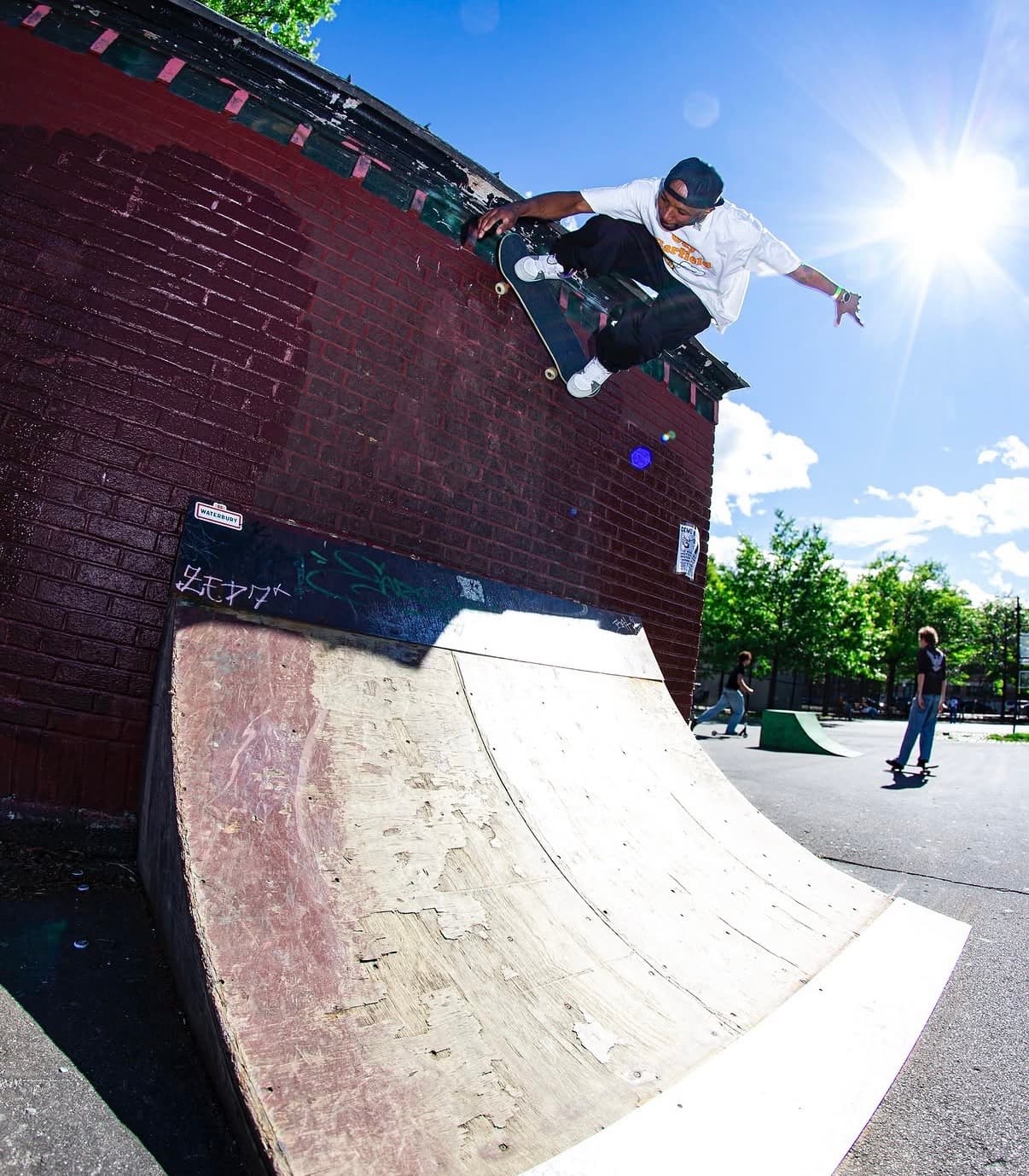 Leon Toppin performing a wallride off a brick wall