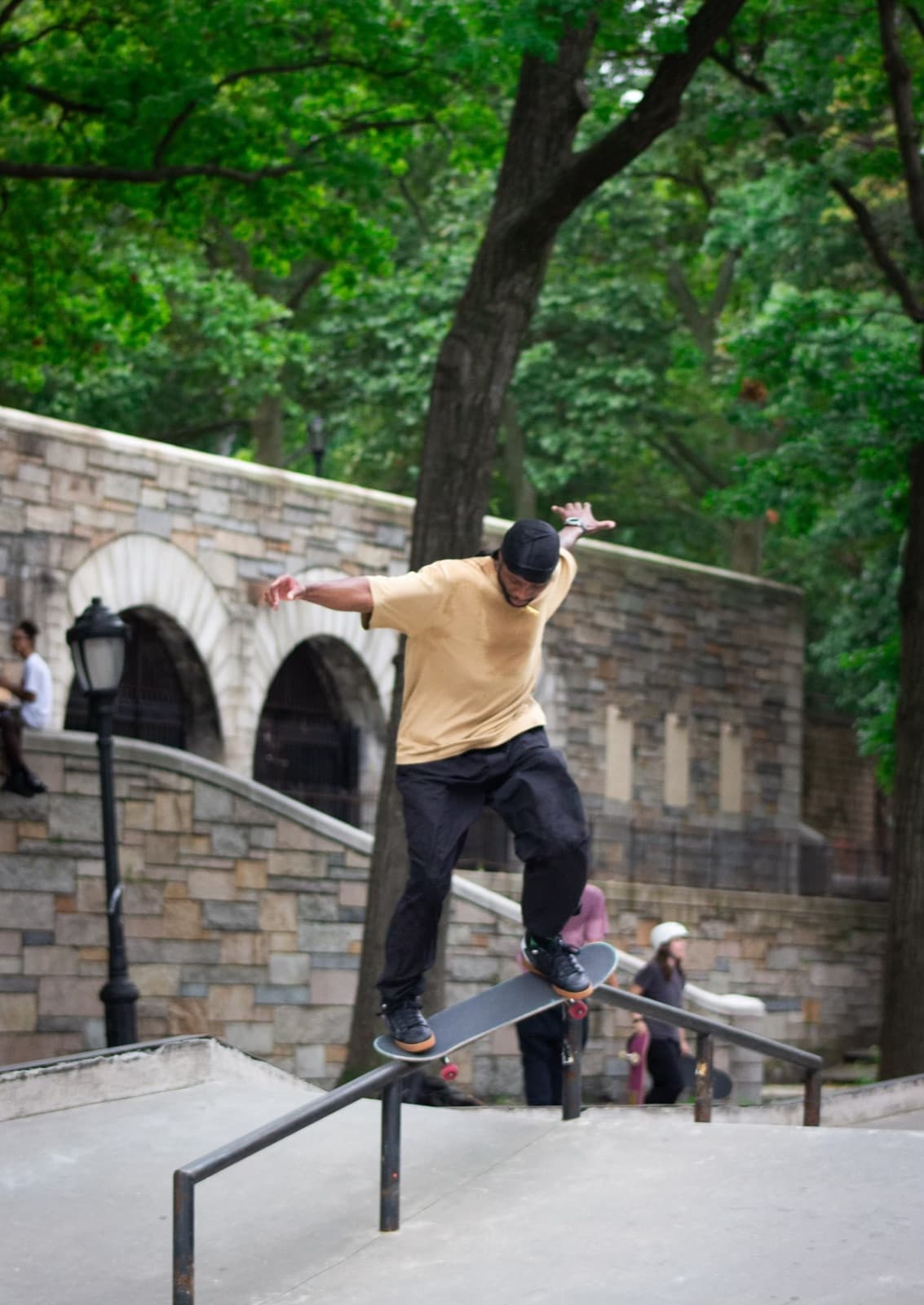 Leon Toppin skateboarding on a Manhattan street near LES Coleman Skatepark