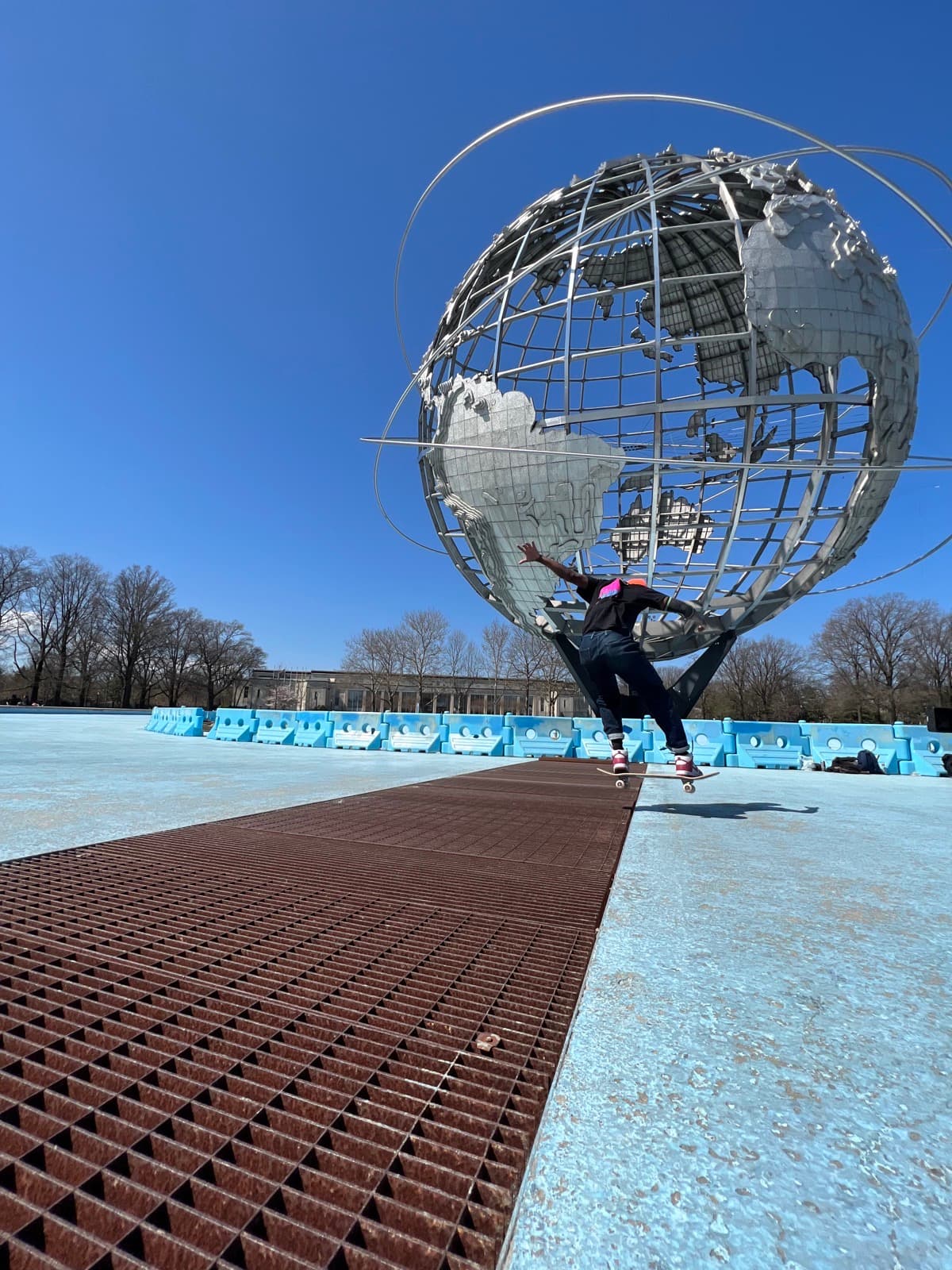 Leon Toppin with students at a Queens skatepark